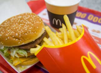 mcdonald's , Saint-Petersburg, December 24, 2018: Hamburger menu in McDonald's restaurant. Fries, coffee capuccino, Big Mac. Fastfood and junk food concept