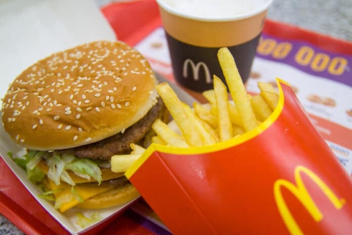 mcdonald's , Saint-Petersburg, December 24, 2018: Hamburger menu in McDonald's restaurant. Fries, coffee capuccino, Big Mac. Fastfood and junk food concept