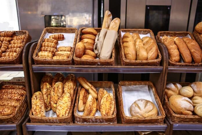 Tasty fresh bakery products in supermarket pane