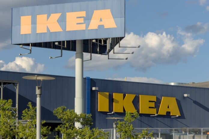 IKEA home furnishings company logo on blue warehouse building in Red Hook, Brooklyn, New York City.