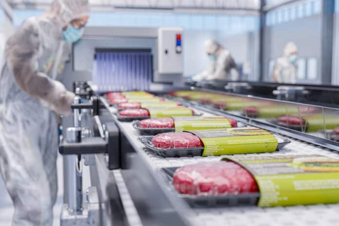 HAMBURGER INGREDIENTI Conveyor in a factory of ready-made plant-based veggie hamburger cutlets - a modern ecological modern factory - 3d illustation HAMBURGER INGREDIENTI
