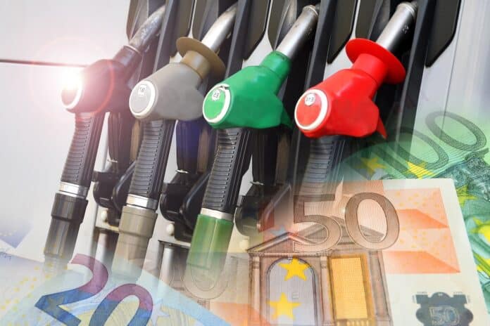 Gas stations and Euro banknotes. Concept for the rise in gasoline and diesel prices due to the war between the US and Iran.