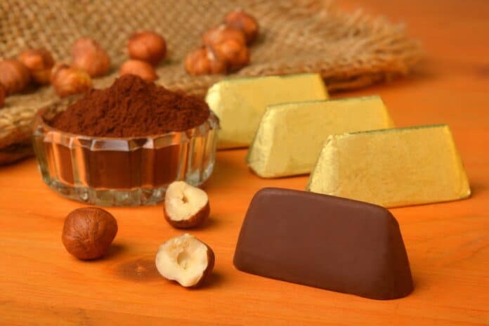 Italian food product, Gianduiotto the traditional Piedmont chocolate with hazelnut. Gianduiotto