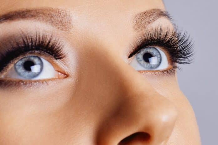 Woman eyes with long eyelashes and smokey eyes make-up. Eyelash extensions, makeup, cosmetics, beauty SIERI CIGLIA