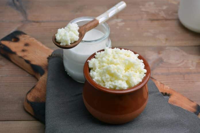 full of keffir, milk and yogurt cups liquid