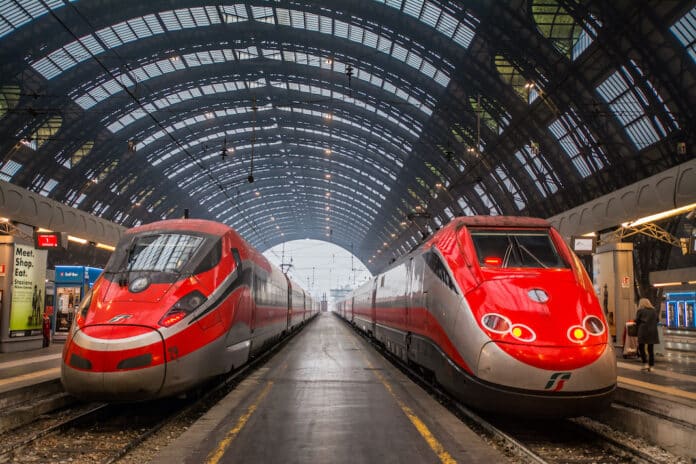 Trenitalia Frecciarossa (Red Arrow) ETR 500 and ETR 1000 high speed express trains at platform of Milano Centrale Station in MILAN, ITALY on JAN 31, 2017: