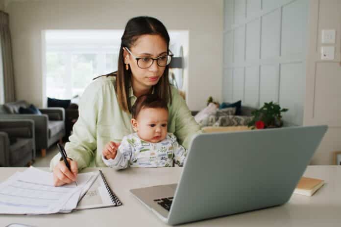 Documents, remote work and woman with baby on laptop for budget, finance consultant and report. Working from home, family and mom with child on computer for financial planning, review and research bonus mamme